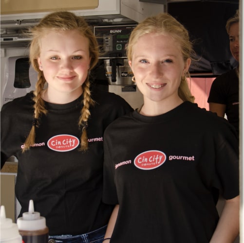 Two girls in a CinCity shirt