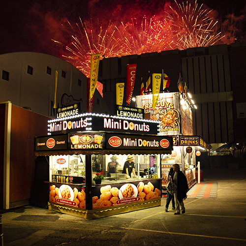Cin City Donuts trailer with fireworks behind