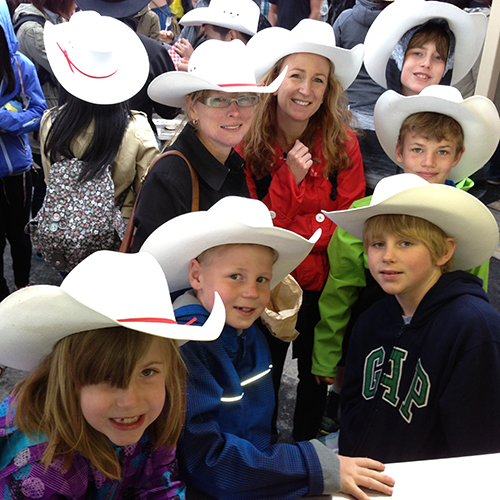 Customers, lids with white cowboy hats