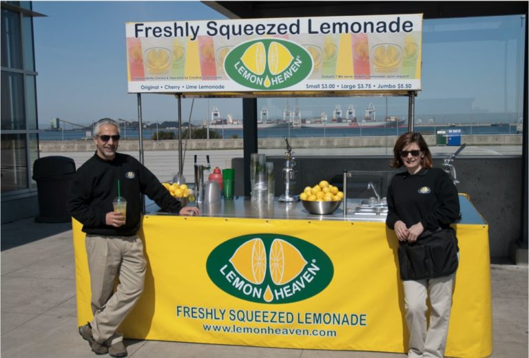 Franchisees standing next to LemonHeaven cart