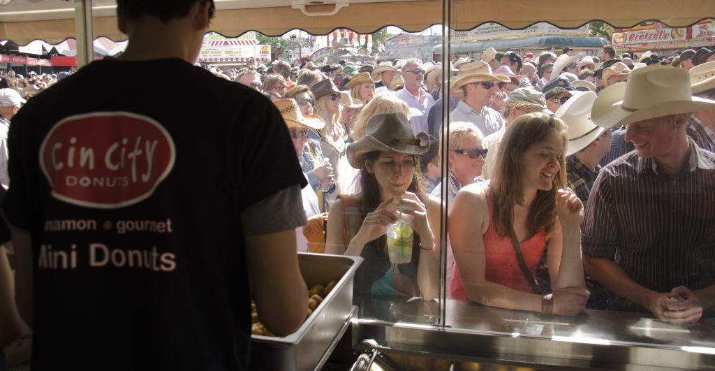 People watching Cin City Donuts being made